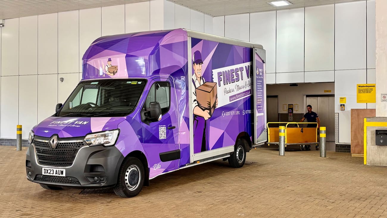 Finest Van removals van with its rear doors open ready to unload belongings at a self storage facility