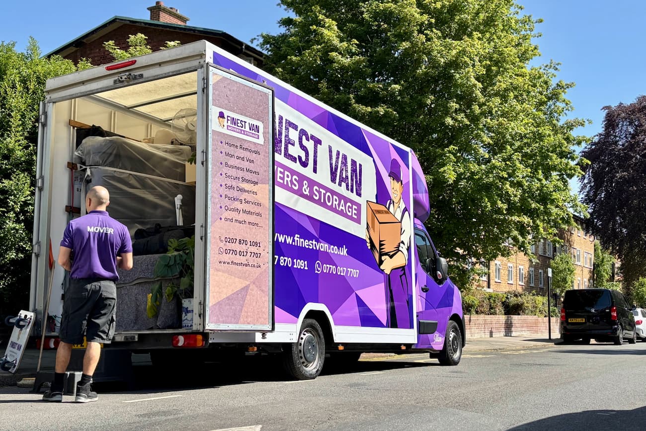 Removal specialist ready to unload a removal van in London Finest Van removal specialist ready to unload a removal van during a London house move